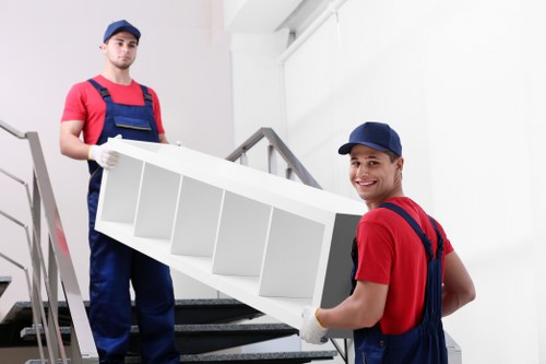 Staff and customers following safety procedures in a storage facility