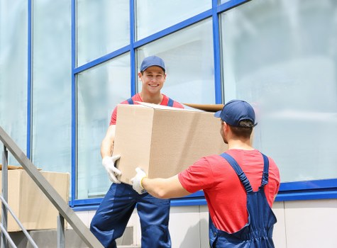 Moving boxes and office furniture in a Brixton commercial relocation