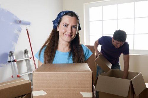 Packed office boxes and furniture prepared for Brixton office removals
