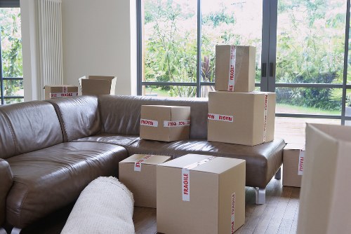 Packed boxes and furniture ready for a small move